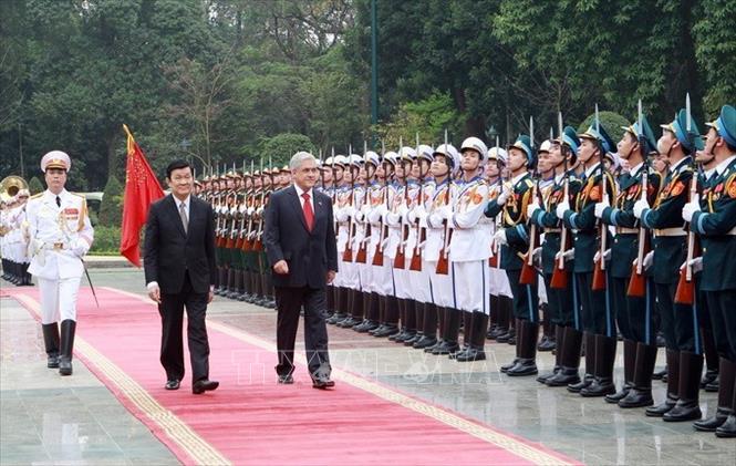 Trong ảnh: Chủ tịch nước Trương Tấn Sang chủ trì Lễ đón Tổng thống Chile Sebastian Piñera Echenique thăm chính thức Việt Nam, ngày 22/3/2012, tại Phủ Chủ tịch. Ảnh: Nguyễn Khang - TTXVN