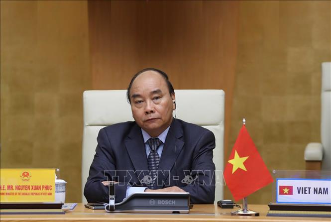 Photo: Prime Minister Xuan Phuc attends the summit in capacity as chair of ASEAN 2020. VNA Photo: Thống Nhất