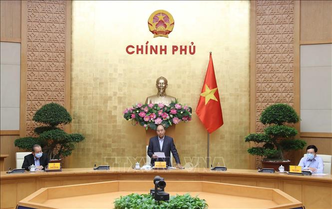 Photo: PM Nguyen Xuan Phuc speaks at the meeting. VNA Photo: Thống Nhất