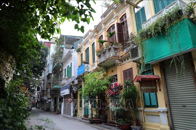 Trong ảnh: Cùng với nhiều con ngõ khác, Hội Vũ như mang cả hồn cốt, tinh thần của đất Kinh kỳ thấm đượm trên những mái phố hôm nay. Ảnh: Thanh Tùng-TTXVN