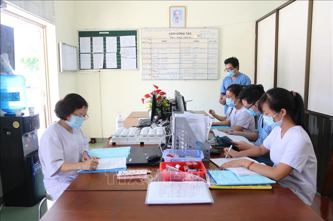 Photo: Doctors on their shifts at a quarantine area at the HCM City-based National University's dormitory. VNA Photo