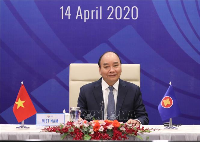 Photo: Vietnamese Prime Minister Nguyen Xuan Phuc, 2020 ASEAN Chairmanship, opens the Summit. VNA Photo: Thống Nhất 