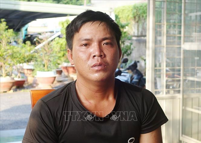 Trong ảnh: Huỳnh Văn Tý tại cơ quan Công an. Ảnh: Công Mạo-TTXVN             