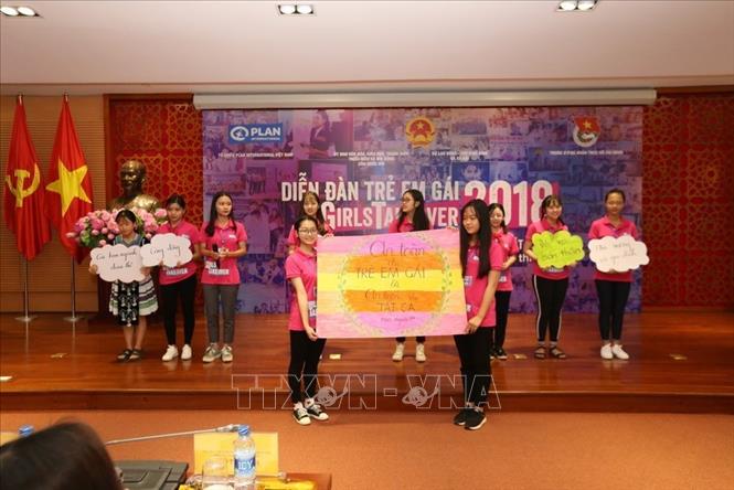 Trong ảnh: Những thông điệp được các trẻ em gái đưa ra tại Diễn đàn Trẻ em gái 2018: “Thúc đẩy quyền của trẻ em gái để thay đổi và phát triển”. Ảnh: Anh Tuấn – TTXVN