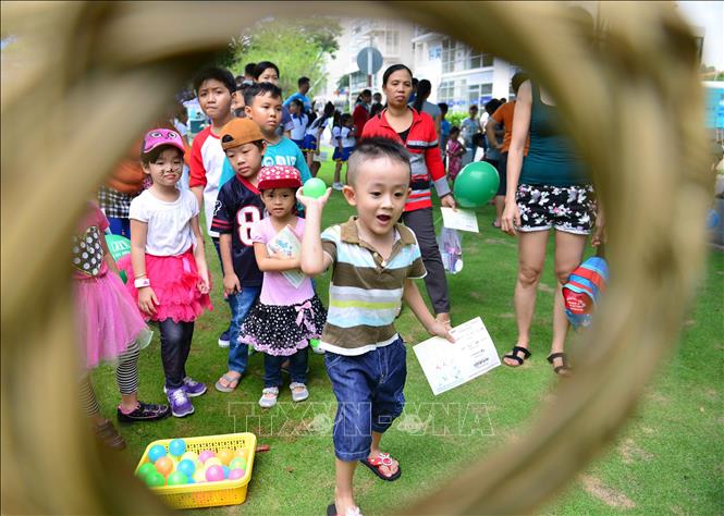 Trong ảnh: Các em nhỏ hào hứng tham gia các hoạt động trong ngày hội “Phú Mỹ Hưng hướng về trẻ em năm 2018”. Ảnh: Thế Anh-TTXVN