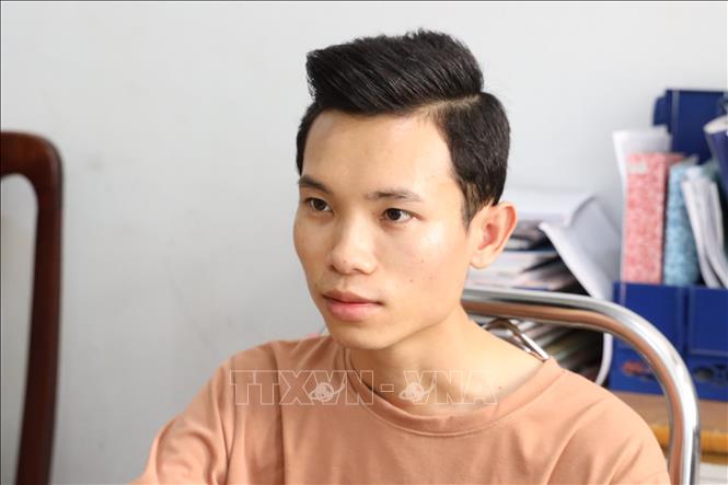 Trong ảnh: Đối tượng Nguyễn Tiến Quân bị bắt giữ. Ảnh: Thanh Tân - TTXVN
