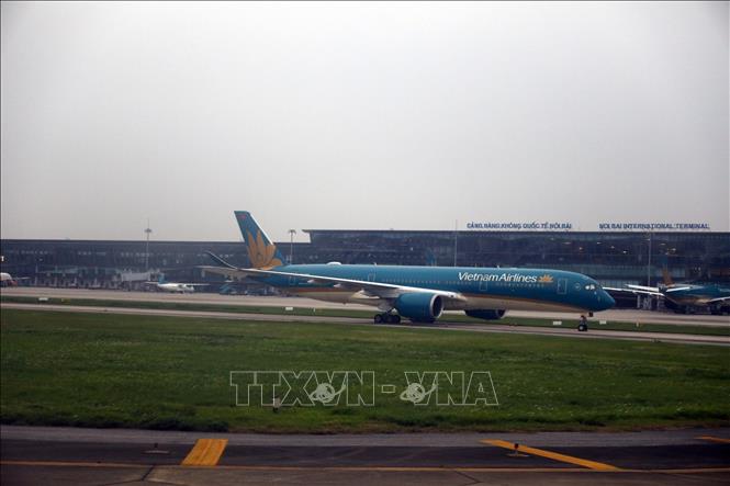 Photo: Vietnam Airlines planes at the Noi Bai International Airport in Hanoi. VNA Photo: Huy Hùng