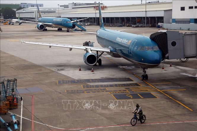 Photo: Vietnam Airlines planes at the Noi Bai International Airport in Hanoi. VNA Photo: Huy Hùng