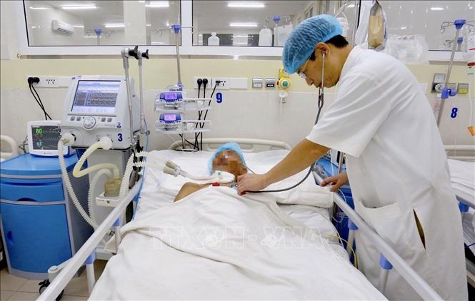 Photo: Caring for a patient at Hue Central Hospital’s stroke centre./. 