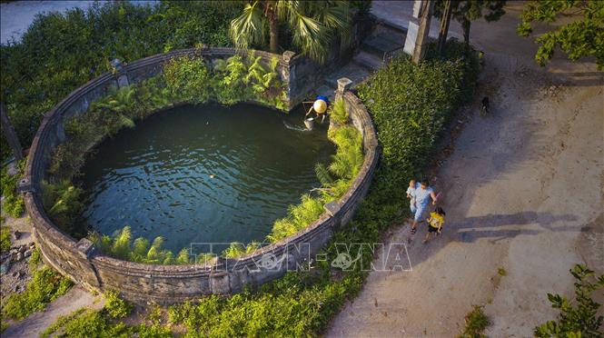 Trong ảnh: Giếng làng cổ tại huyện Hoa Lư. Ảnh: Minh Đức - TTXVN