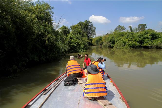 Photo: A section of the Vam Co Dong River running through the new National Park in Tan Bien district. VNA Photo: Lê Đức Hoảnh 