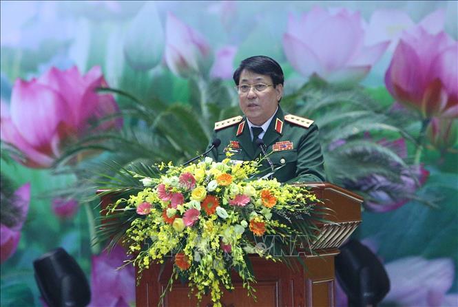 Trong ảnh: Đại tướng Lương Cường, Chủ nhiệm Tổng cục Chính trị Quân đội nhân dân Việt Nam báo cáo công tác thi đua. Ảnh: Dương Giang - TTXVN