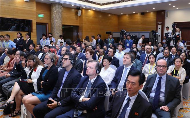 Photo: Foreign delegates attend the summit's opening ceremony. VNA Photo