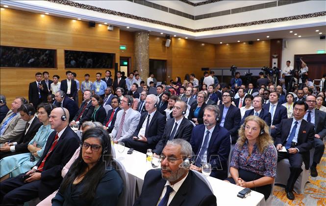 Photo: Delegates attend the summit's opening ceremony. VNA Photo