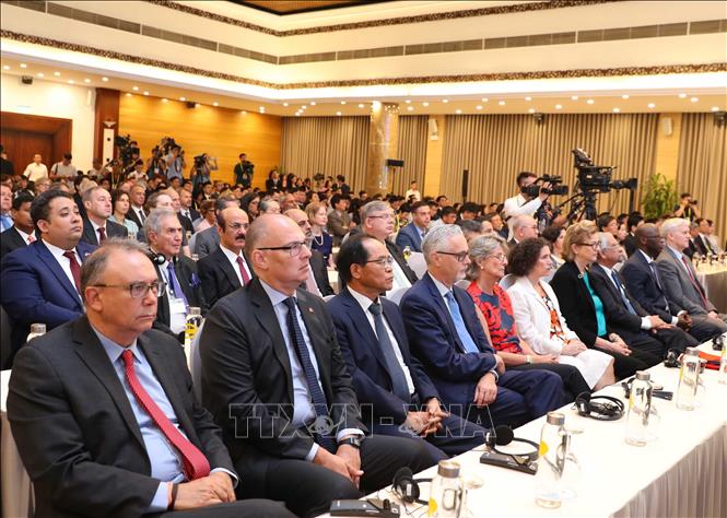 Photo: Delegates attend the summit's opening ceremony. VNA Photo