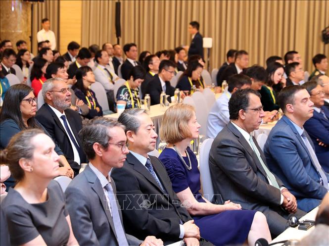 Photo: Delegates attend the summit's opening ceremony. VNA Photo