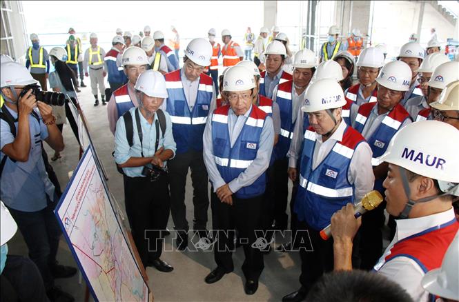 Photo: Deputy Prime Minister Pham Binh Minh inspects the construction site of the Ben Thanh-Suoi Tien metro line. VNA Photo: Tiến Lực