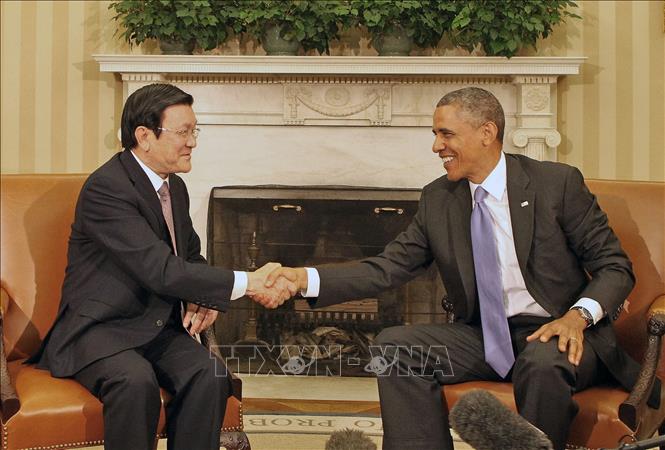 Trong ảnh: Ngày 25/7/2013, Tổng thống Barack Obama hội đàm với Chủ tịch nước Trương Tấn Sang tại Nhà Trắng ở Thủ đô Washington D.C. Hai bên xác lập khuôn khổ quan hệ Đối tác toàn diện. Đây là một dấu mốc quan trọng, khẳng định xu thế phát triển tất yếu của quan hệ Việt Nam - Hoa Kỳ, đồng thời tạo nền tảng vững chắc cho sự phát triển của quan hệ hai nước trong tương lai. Ảnh: Nguyễn Khang – TTXVN
