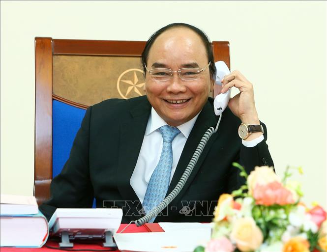 Trong ảnh: Ngày 14/12/2016, Thủ tướng Nguyễn Xuân Phúc đã có cuộc điện đàm với Tổng thống đắc cử Donald Trump, khẳng định Việt Nam coi trọng quan hệ hữu nghị, hợp tác với Hoa Kỳ. Tổng thống Donald Trump khẳng định mong muốn hợp tác với Việt Nam để cùng thúc đẩy quan hệ. Ảnh: Thống Nhất - TTXVN