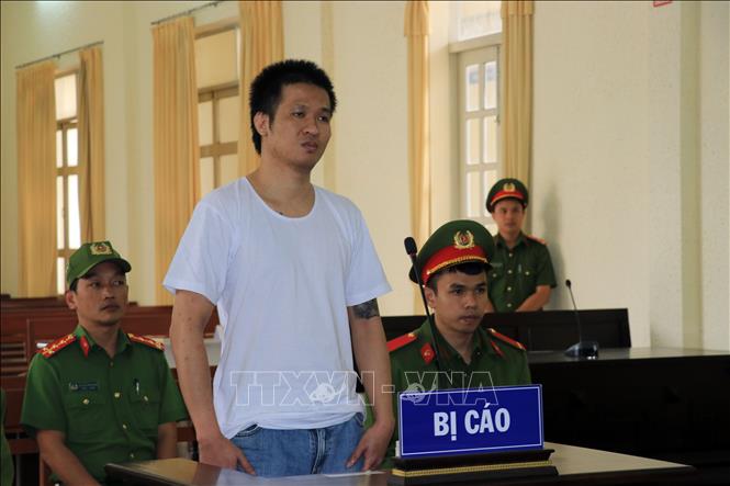Trong ảnh: Bị cáo Nguyễn Quốc Đức Vượng nghe Hội đồng xét xử tuyên án. Ảnh: Chu Quốc Hùng-TTXVN