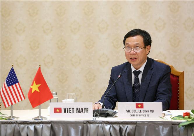 Photo: Colonel Le Dinh Vu, Head of the Office 701 speaks at the workshop in Hanoi. VNA Photo: Dương Giang