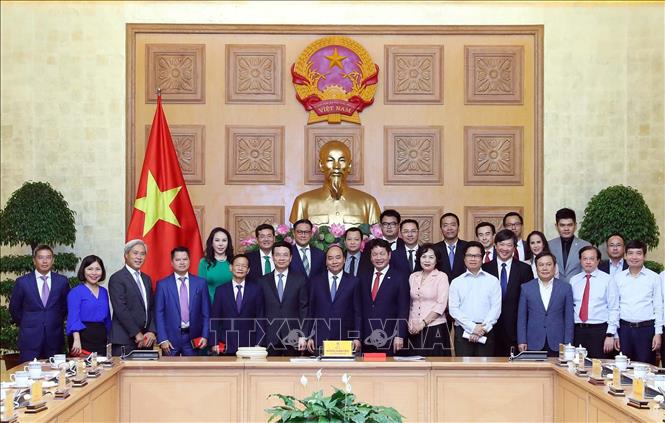 Trong ảnh: Thủ tướng Nguyễn Xuân Phúc và các đại biểu. Ảnh: Thống Nhất- TTXVN

