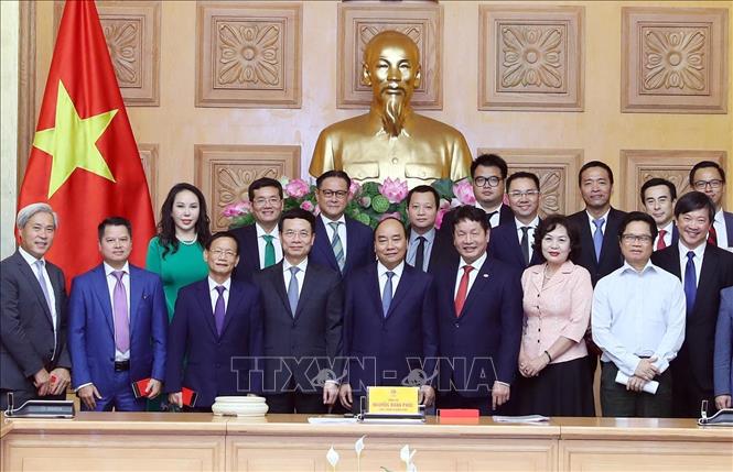 Trong ảnh: Thủ tướng Nguyễn Xuân Phúc và các đại biểu. Ảnh: Thống Nhất - TTXVN
