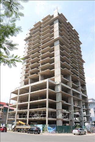 Trong ảnh: Dự án tòa nhà hỗn hợp Thái Nguyên Tower chưa hoàn thành phần thô. Ảnh: Hoàng Nguyên - TTXVN