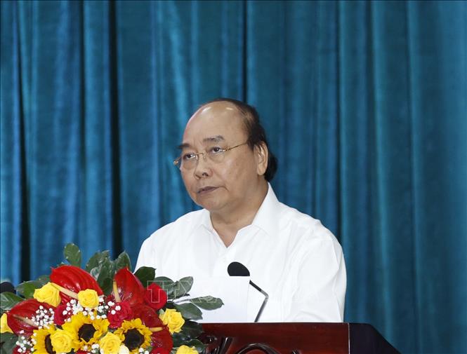 Photo: PM Nguyen Xuan Phuc speaks at the working session. VNA Photo: Thống Nhất