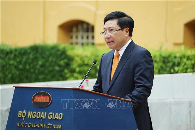 Photo: Deputy Prime Minister and Foreign Minister Pham Binh Minh speaks at the ceremony. VNA Photo: Lâm Khánh