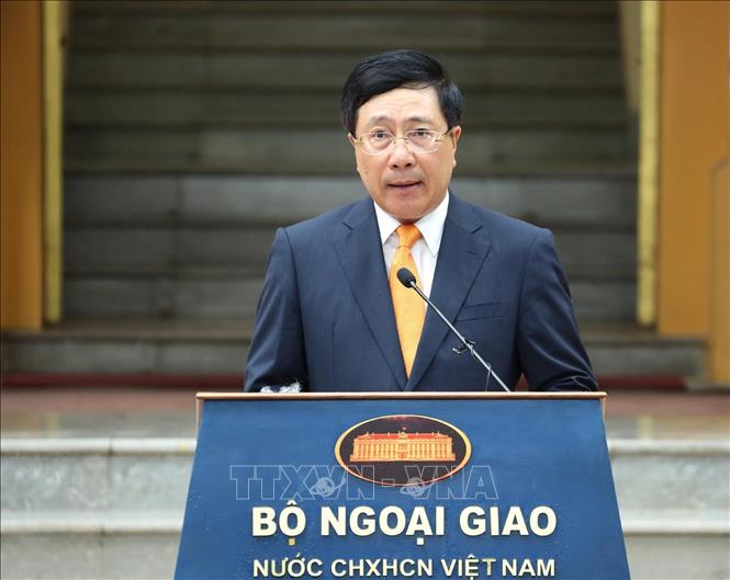 Photo: Deputy Prime Minister and Foreign Minister Pham Binh Minh speaks at the ceremony. VNA Photo: Lâm Khánh