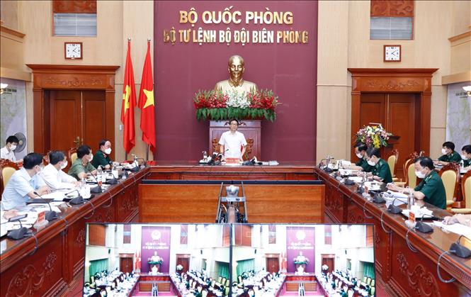 Photo: Deputy PM Vu Duc Dam during the working sesssion with the Border Guard High Command. VNA Photo: Dương Giang