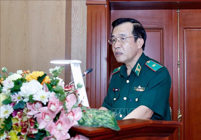 Photo: Deputy Commander of the Border Guard Major General Le Duc Thai delivers a report at the meeting. VNA Photo: Dương Giang