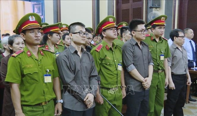 Trong ảnh: Ngày 21/8/2018, Tòa án nhân dân Thành phố Hồ Chí Minh mở phiên tòa sơ thẩm xét xử 12 bị cáo là thành viên của tổ chức phản động “chính phủ quốc gia Việt Nam lâm thời” về tội “Hoạt động nhằm lật đổ chính quyền nhân dân”, do đối tượng Đào Minh Quân cầm đầu. Ảnh: Thành Chung - TTXVN