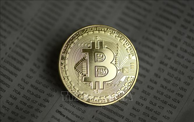Trong ảnh: Đồng Bitcoin tại Dortmund, miền tây nước Đức, ngày 27/1/2020. Ảnh: AFP/ TTXVN