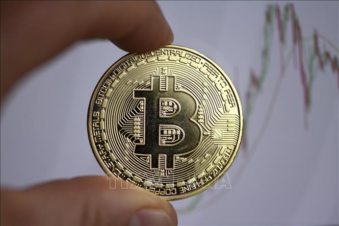 Trong ảnh: Đồng Bitcoin tại Dortmund, miền tây nước Đức, ngày 27/1/2020. Ảnh: AFP/ TTXVN