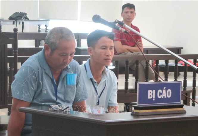 Trong ảnh: Các bị cáo tại phiên xét xử. Ảnh: Doãn Tấn - TTXVN