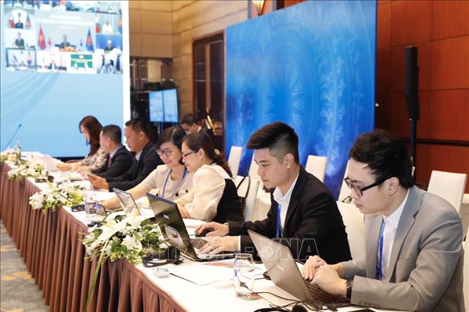 Trong ảnh: Các đại biểu tham dự hội nghị tại đầu cầu Hà Nội. Ảnh: Trần Việt - TTXVN 