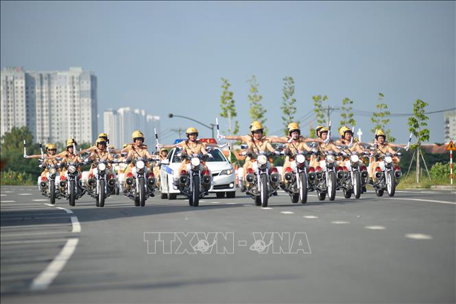 Photo: The police escort members in formation during a simulated motorcade leading scenario. VNA Photo: Thành Chung