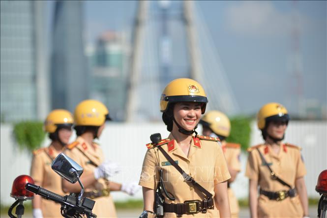 Photo: Members of HCM City's police escort. VNA Photo: Thành Chung