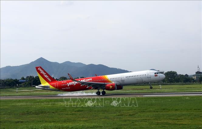 Photo: Planes of Vietjet Air at Noi Bai airport in Hanoi. VNA Photo: Huy Hùng