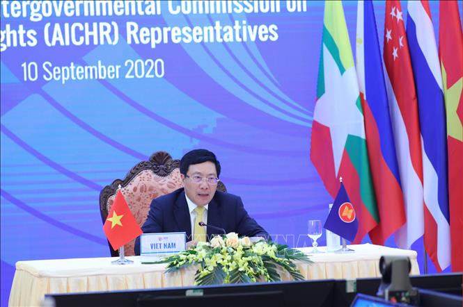 Photo: Vietnamese Deputy Prime Minister, Foreign Minister Pham Binh Minh chairs the event from Hanoi. VNA Photo: Lâm Khánh