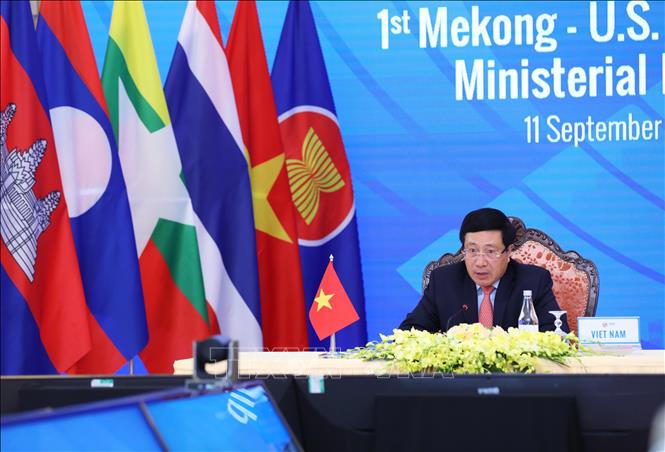 Photo: Vietnamese Deputy Prime Minister, Foreign Minister Pham Binh Minh chairs the meeting from Hanoi. VNA Photo: Lâm Khánh