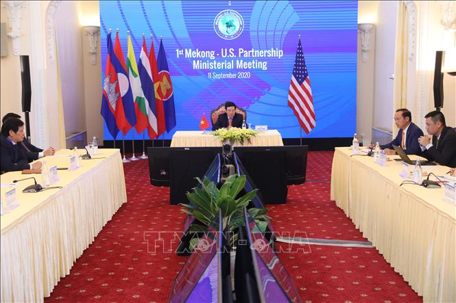 Photo: Vietnamese Deputy Prime Minister, Foreign Minister Pham Binh Minh chairs the meeting from Hanoi. VNA Photo: Lâm Khánh