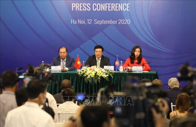 Photo: Vietnamese Deputy Prime Minister, Foreign Minister Pham Binh Minh chairs the press conference. VNA Photo
