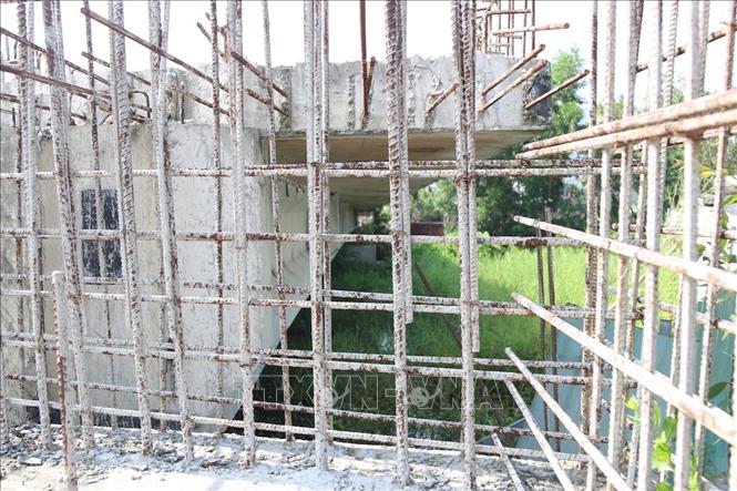 Trong ảnh: Dự án đường nối Phạm Văn Đồng đến nút giao thông Gò Dưa- Quốc lộ 1 thi công dang dở. Ảnh: Trần Xuân Tình - TTXVN
