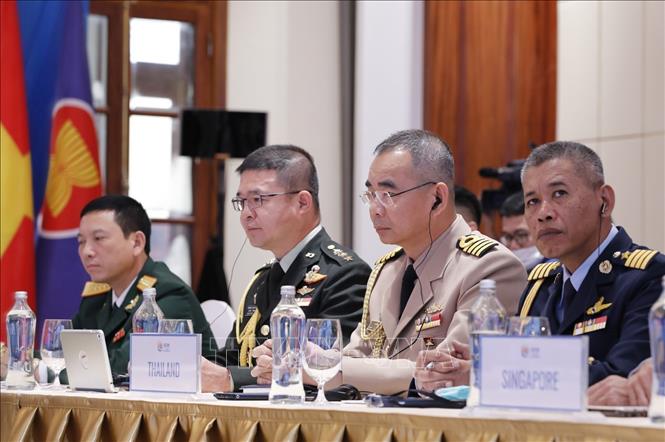 Photo: ASEAN military attaches to Vietnam at the meeting in Hanoi. VNA Photo: Dương Giang