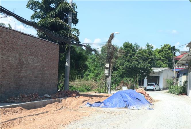 Trong ảnh: Một góc công trường thi công cải tạo, nâng cấp đường Phú Thái. Ảnh: Hoàng Nguyên - TTXVN