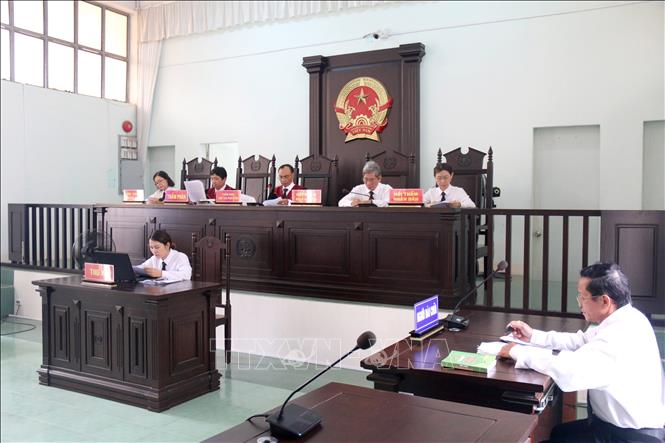 Trong ảnh: Quang cảnh phiên tòa. Ảnh: Nguyễn Thanh - TTXVN