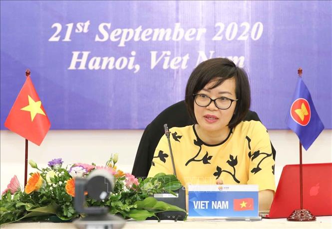 Photo: Deputy Director General of the Ministry of Labour, War Invalids and Social Affairs's Department of International Cooperation Ha Thi Minh Duc speaks at the forum. VNA Photo: Thanh Tùng